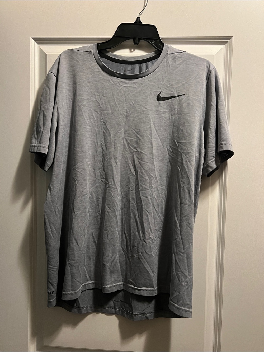Nike Light Gray Short Sleeve Dri-FIT Tee with Black Swoosh